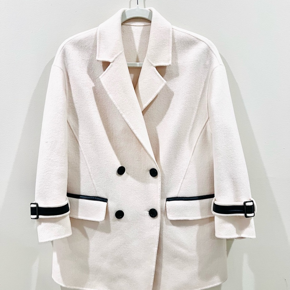 Chic Double-Breasted Cream Coat with Black Accents